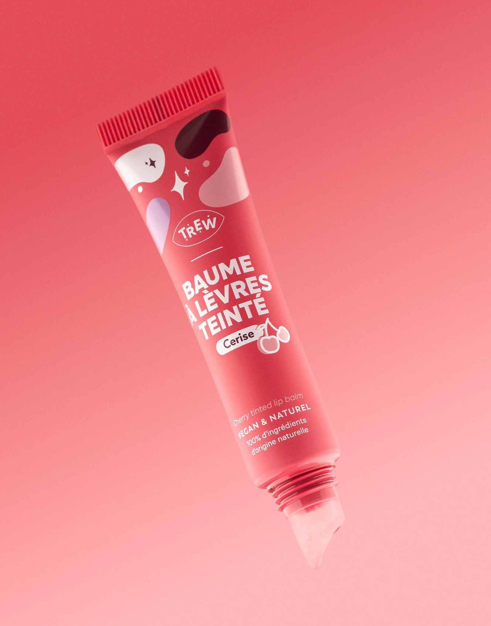 Trew — baume à lèvres teinté sur fond rose